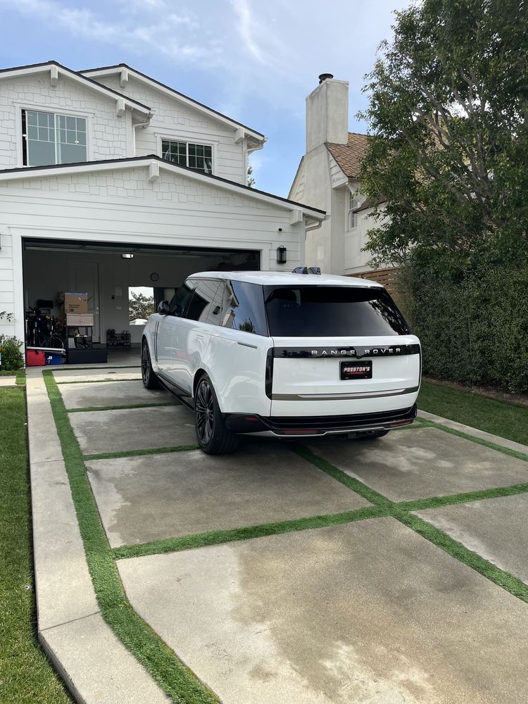 White Rivian SUV