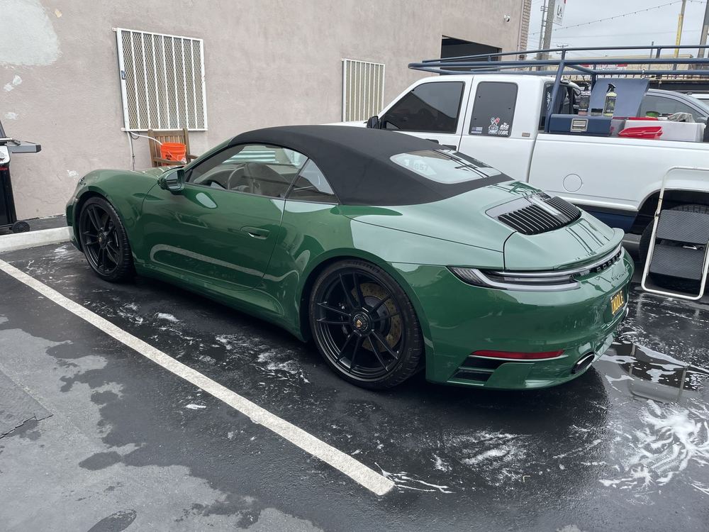 Green Porsche 911 convertible