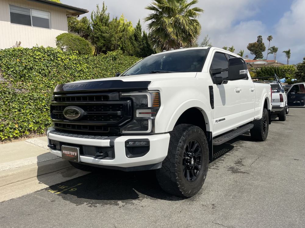 White Ford Super Duty truck